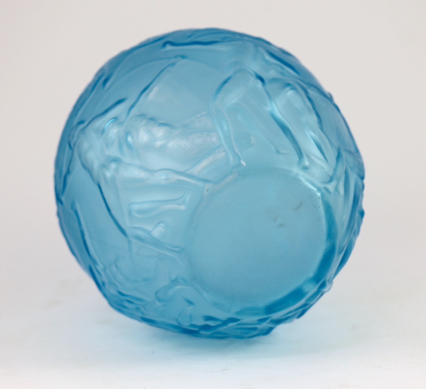 A Lalique style Archers pattern blue glass vase, 26cms high